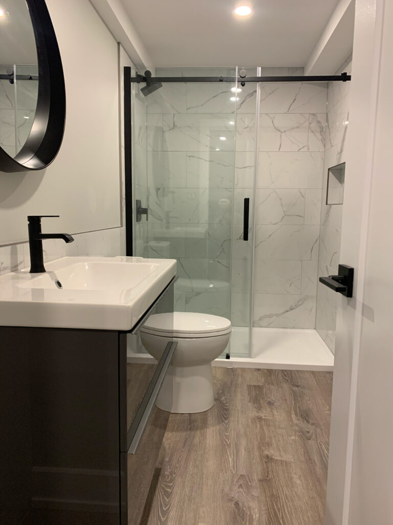 Modern bathroom with glass shower and vanity