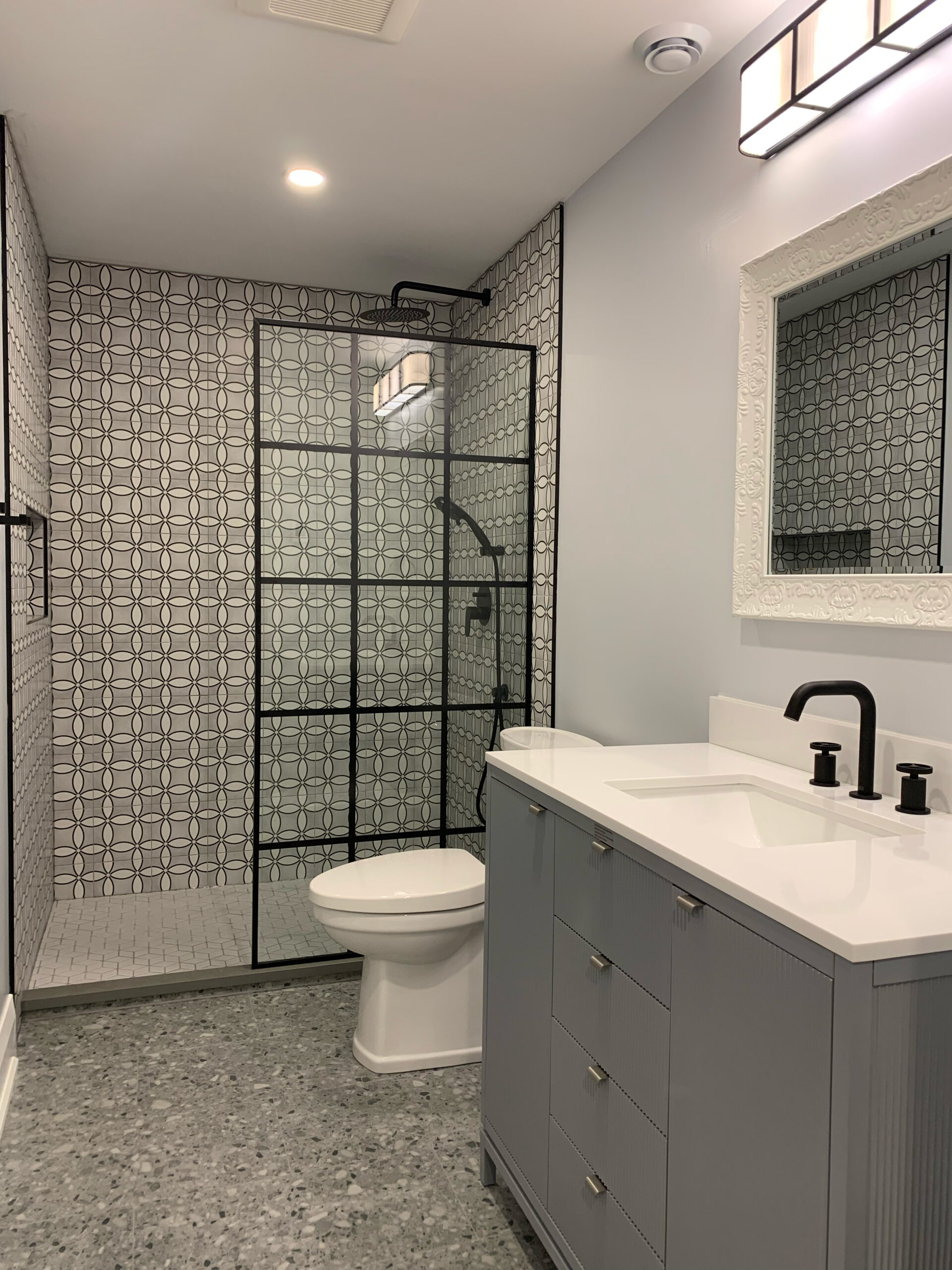 Bathroom renovation with glass shower and vanity