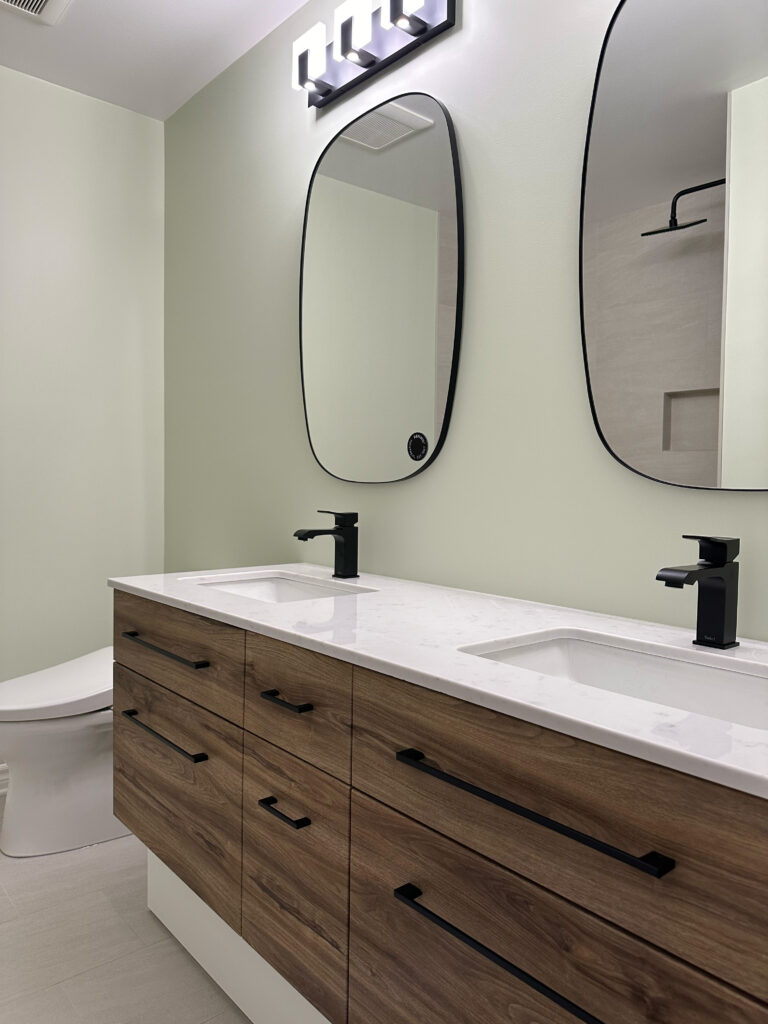 Wood double vanity with modern mirrors